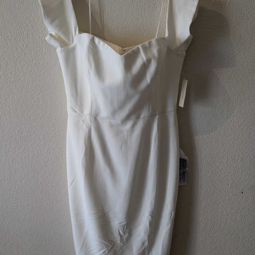 Elegant White Dress with Ruffle Sleeves